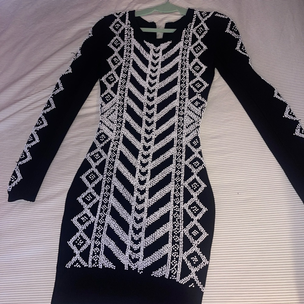 Black and white handbeaded long sleeve bodycon dress.